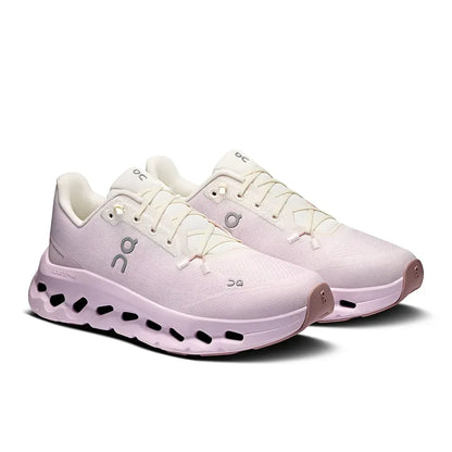 Tênis esportivo feminino branco com sola tecnológica, detalhes lilás e logo visível, ideal para corrida