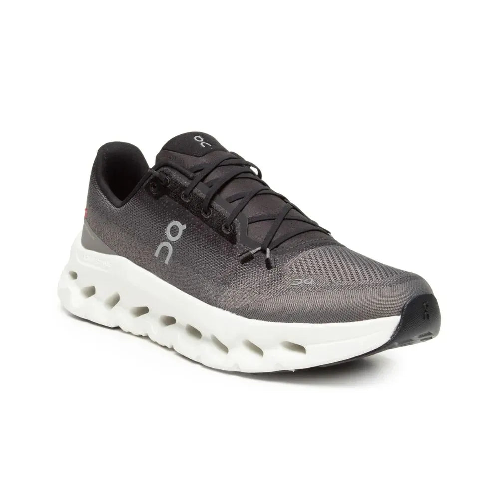 Tênis esportivo preto e cinza com sola branca, design moderno, ideal para corrida e treino