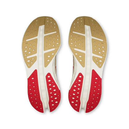 Solado de tênis esportivo premium nas cores bege e vermelho, design respirável e moderno.