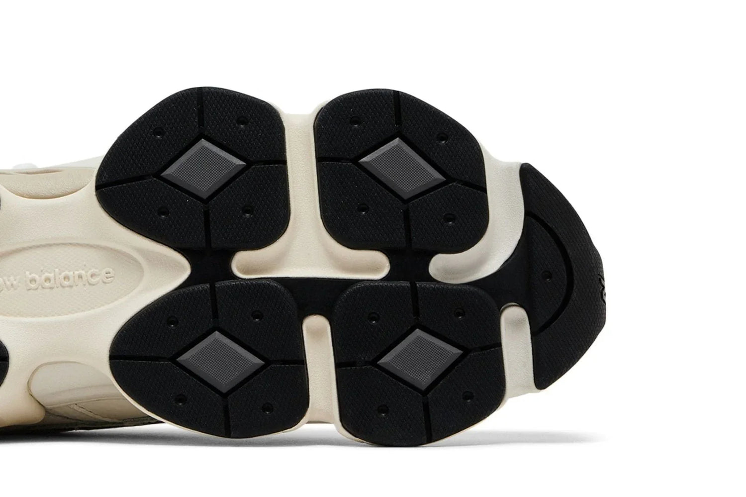 Sola do tênis esportivo cinza com detalhes pretos e design moderno geométrico.