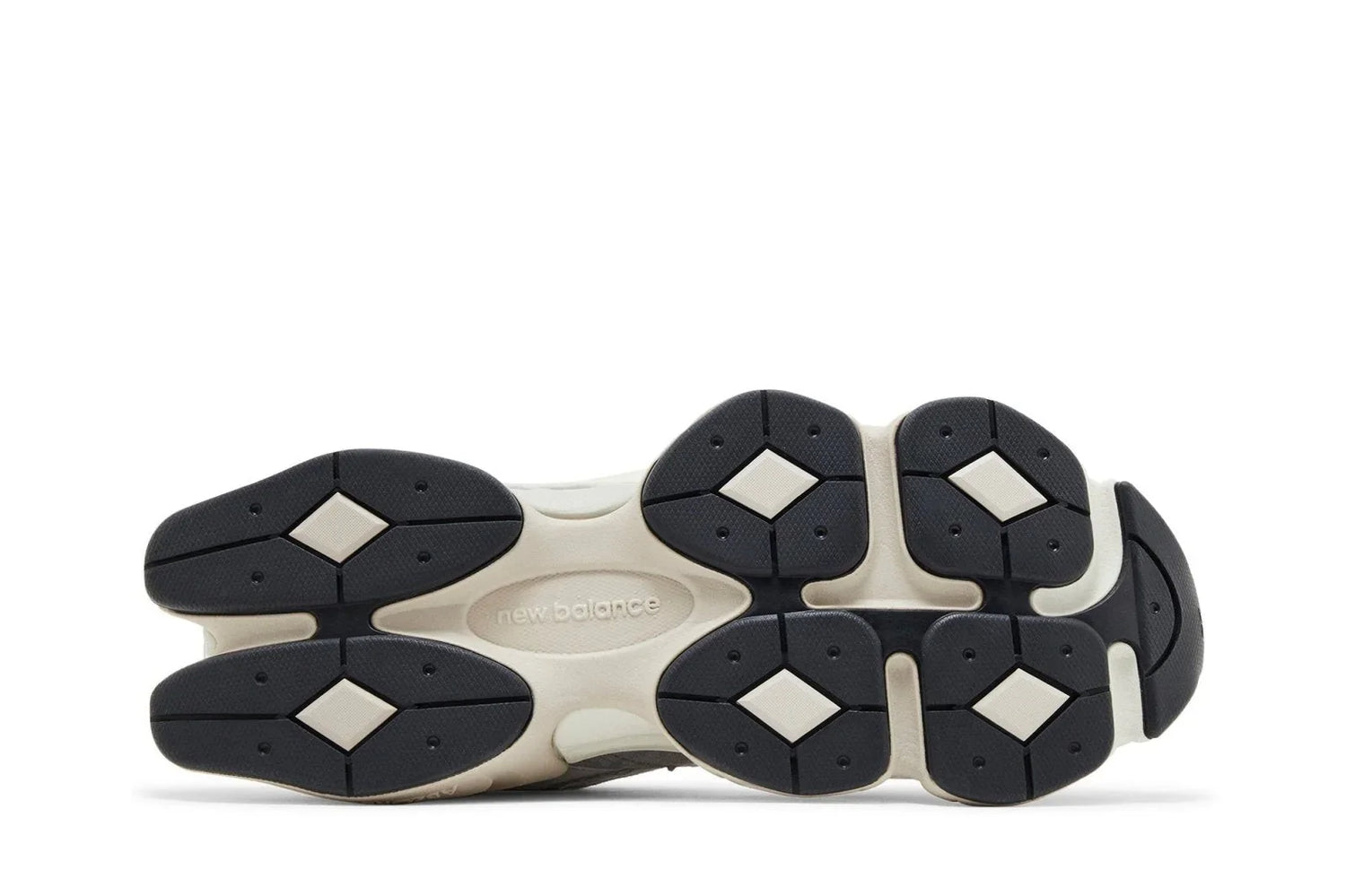 Sola do tênis cinza New Balance 9060 com detalhes em preto e branco, vista inferior.