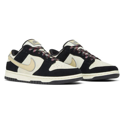 Tênis Nike Dunk Low LX Black Team Gold Preto - par em vista diagonal