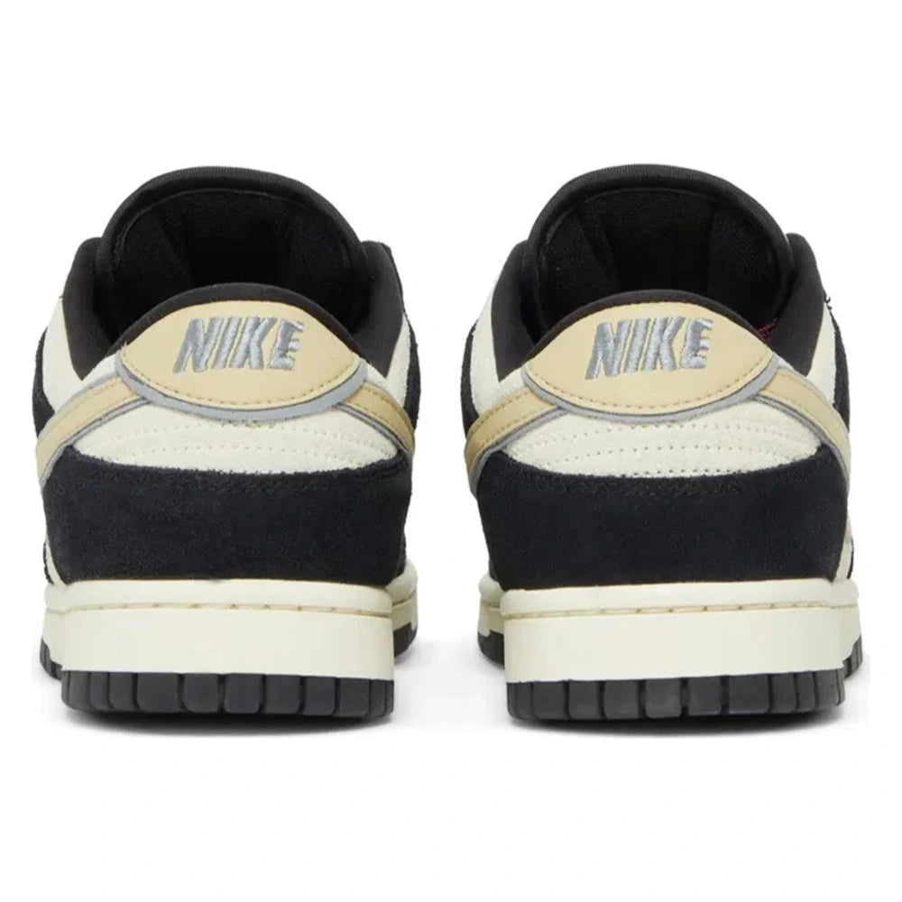 Tênis Nike Dunk Low LX Black Team Gold Preto - par em vista traseira