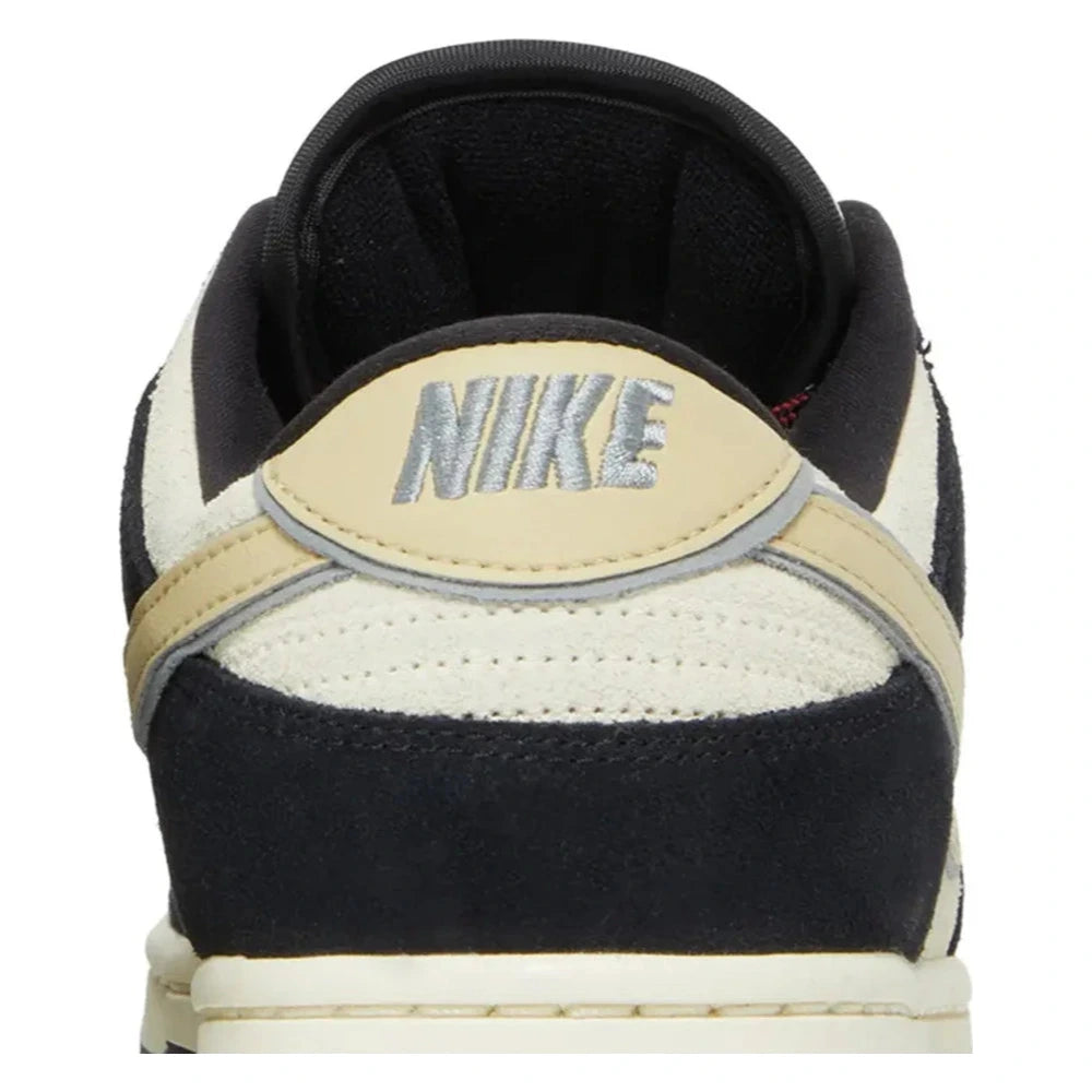 Tênis Nike Dunk Low LX Black Team Gold Preto - detalhe do calcanhar