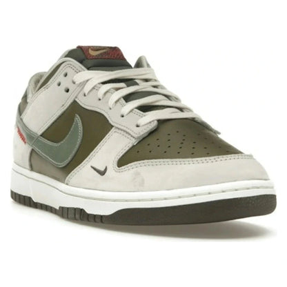 Tênis Nike Dunk Low Year of the Snake 2025 Verde - vista diagonal frontal
