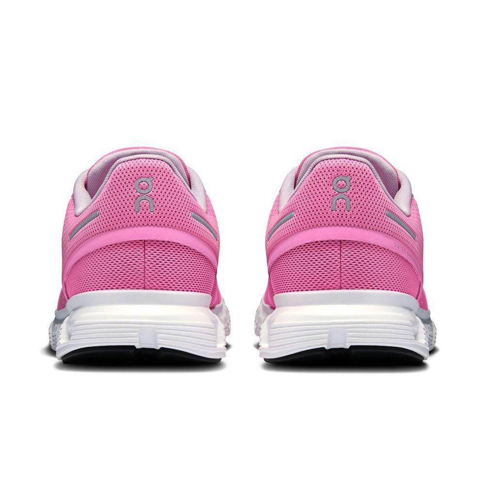 Tênis esportivo rosa On Running Cloud 6 visto de trás, com solado branco.