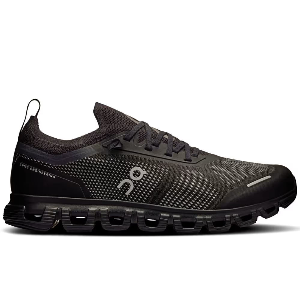 Tênis esportivo masculino preto com sola alta On Running Cloud 6 Versa, design moderno.