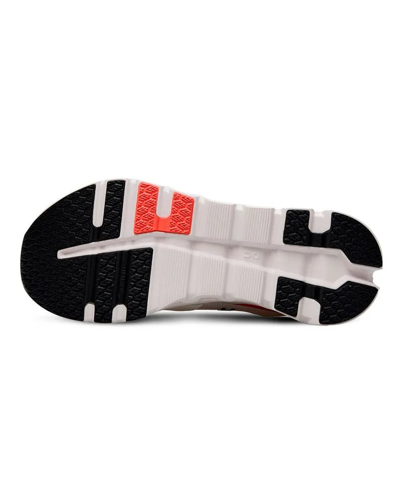 Solado do tênis On Running Cloudrunner 2 branco com base estruturada e elementos vazados aparentes