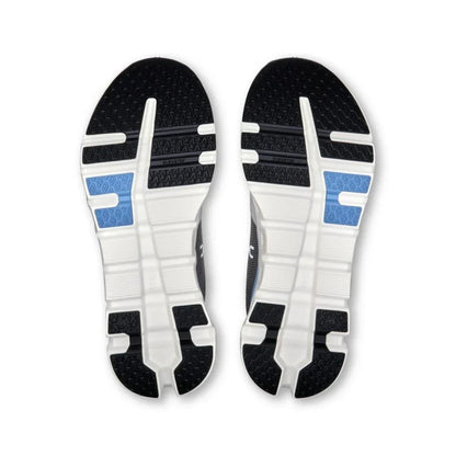 Solado de tênis esportivo cinza com detalhes azul celeste, design antiderrapante moderno.