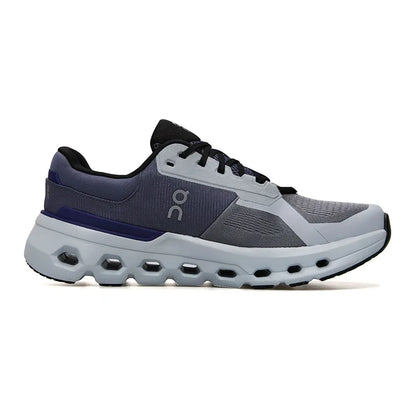 Tênis esportivo cinza e azul com solado robusto e design moderno, vista lateral