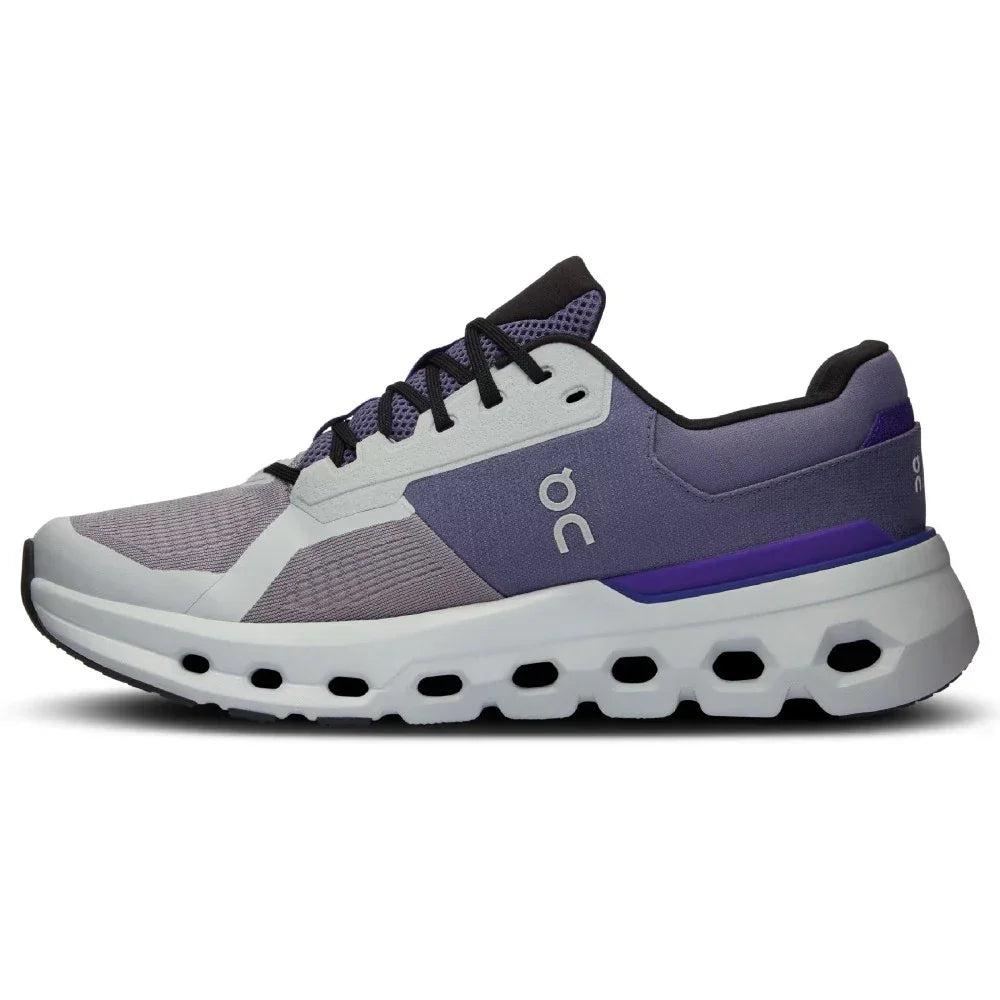 Tênis esportivo cinza e roxo, perfil lateral, sola com recortes, design moderno.