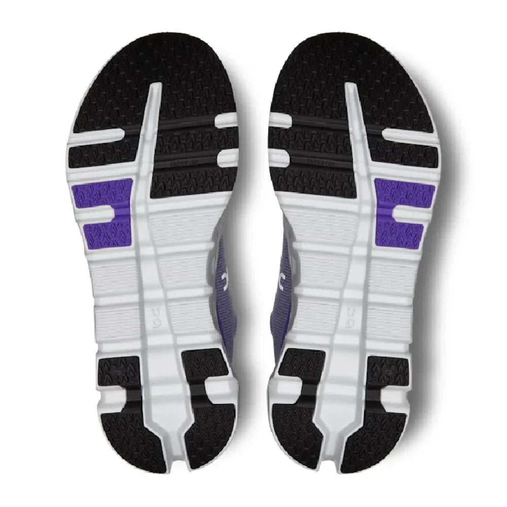 Solado do tênis cinza e roxo On Running Cloudrunner 2 com detalhes em preto e roxo