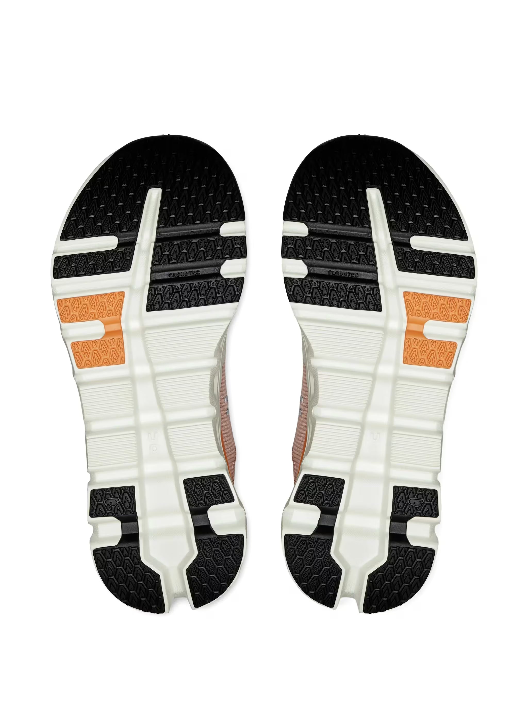 Solado de tênis On Running Cloudrunner 2 com detalhes em preto, branco e laranja, esculpido para tração.